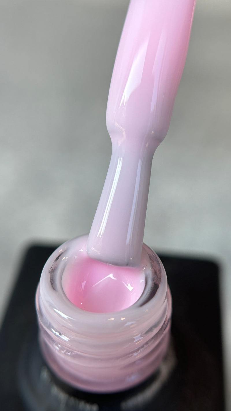 The UV Base Coat by Alisa Nails is the ideal foundation for a long-lasting and flawless manicure. It ensures optimal adhesion of UV gel or UV polish and helps prevent chipping. The base coat is easy to apply, self-leveling, and cures under UV or LED light. Suitable for all nail types, it protects the natural nail from discoloration and provides a smooth finish, significantly extending the durability of your manicure.